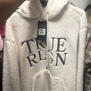 It’s a true religion pull over sharp hoodie. Color birch XL
